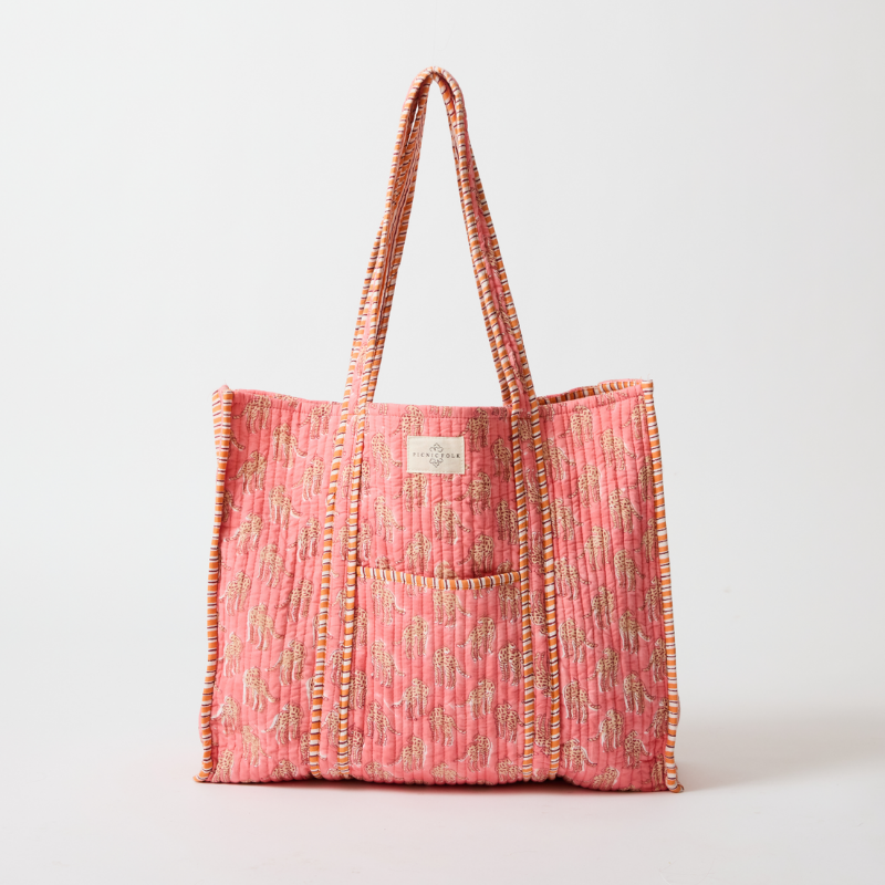 Handcrafted reversible tote bag in Cheetah Pink, quilted cotton by Picnic Folk. Two looks in one bag. Deep front pocket.