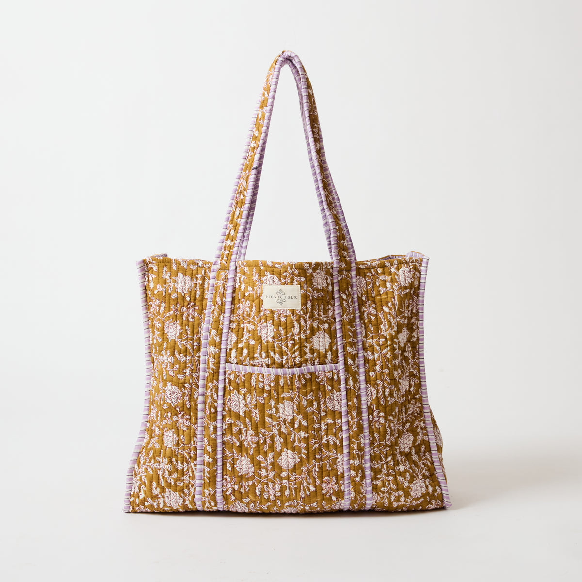 Handcrafted reversible tote bag in Cinnamon, quilted cotton by Picnic Folk. Two looks in one bag. Deep front pocket.