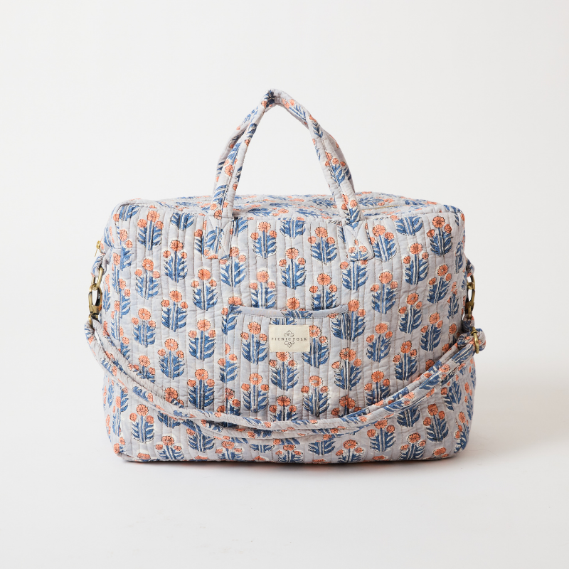 Handcrafted quilted overnight duffel bag in Moonlight Blue by Picnic Folk. Gold hardware and metallic quilting.