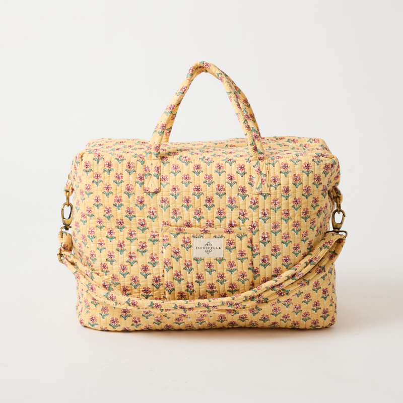 Handcrafted quilted overnight duffel bag in Scarlet by Picnic Folk. Gold hardware and metallic quilting.